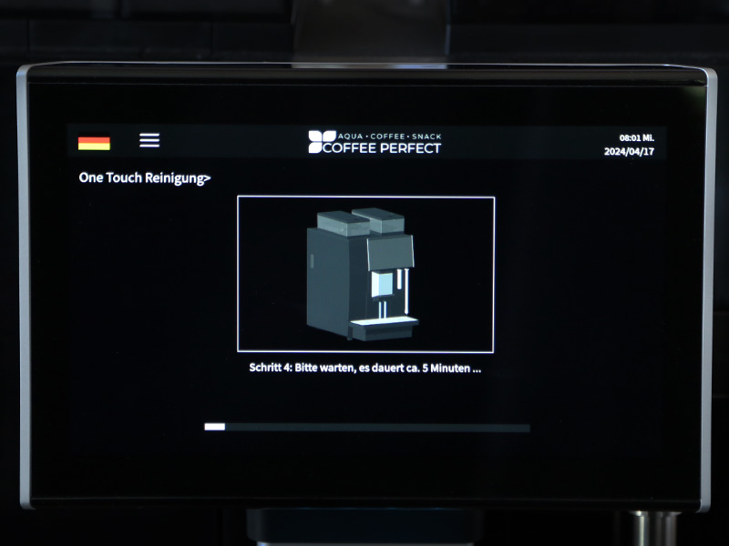 Display zeigt Fortschrittsanzeige waehrend des automatischen Reinigungsvorgangs.